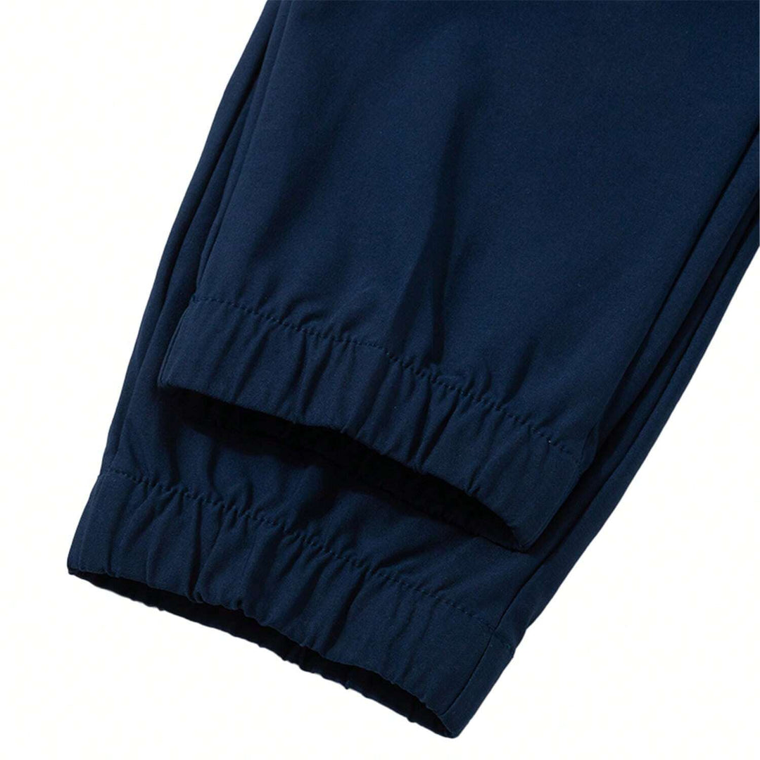 Pantaloni UNDER ARMOUR, bleumarin