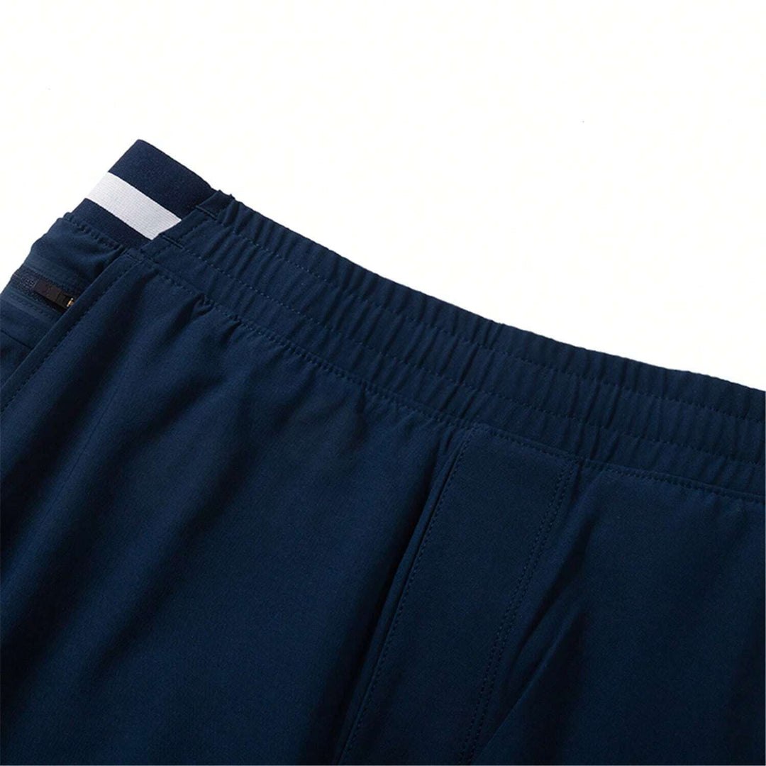 Pantaloni UNDER ARMOUR, bleumarin