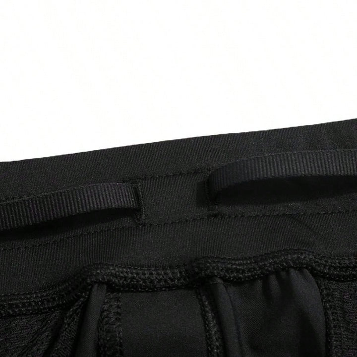 UNDER ARMOUR nadrág, fekete