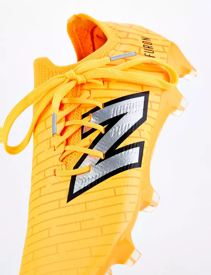 New Balance narancssárga futballcipő